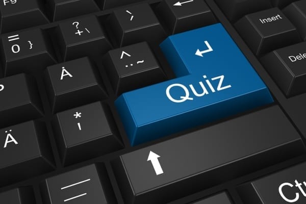 keyboard-with-a-blue-button-saying-quiz