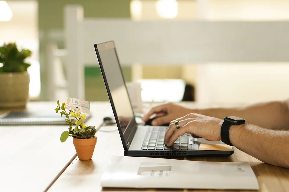 person-typing-on-laptop-computer